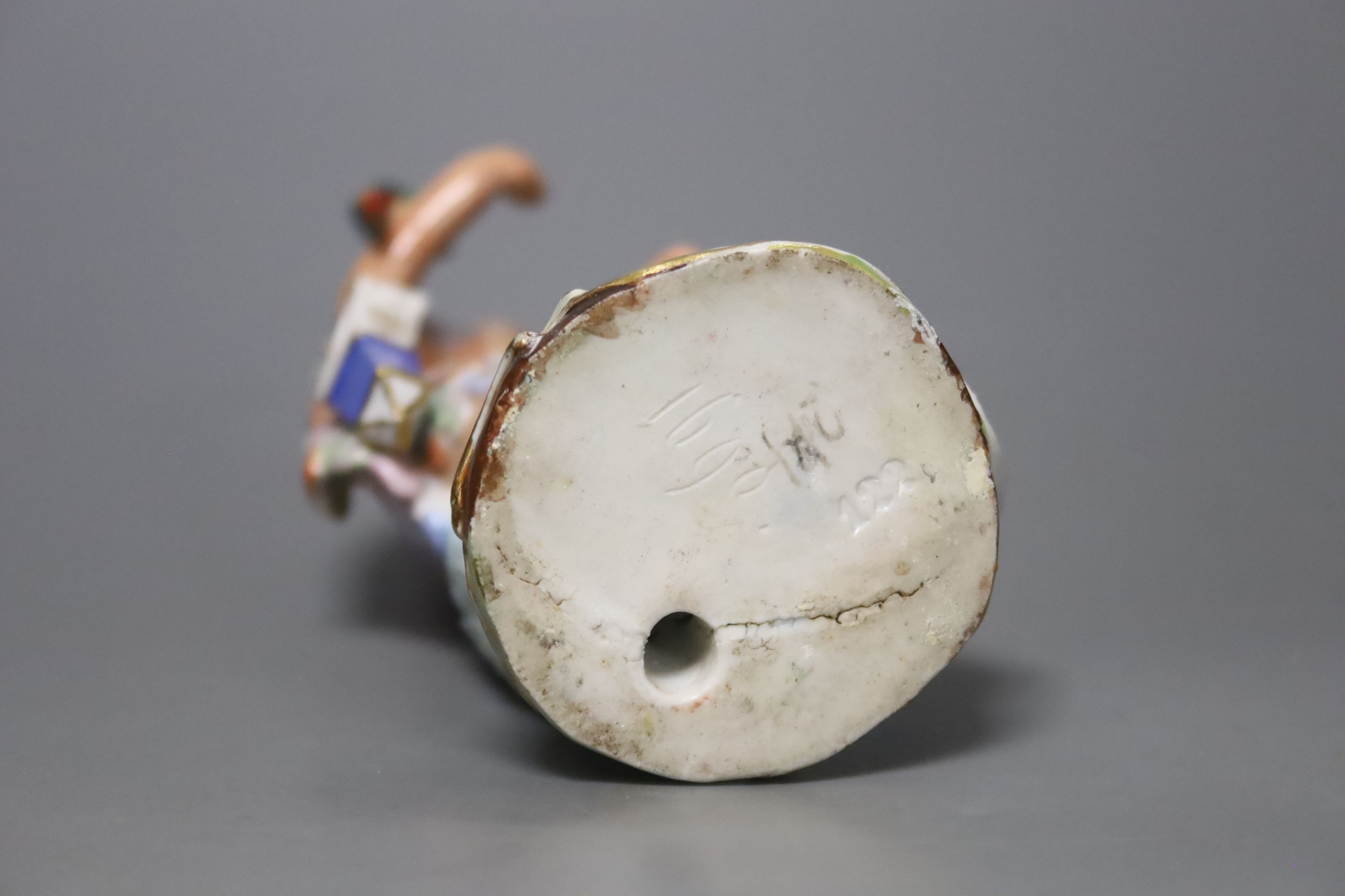 A Meissen figure of a Native American, 19th century, height 16cm
